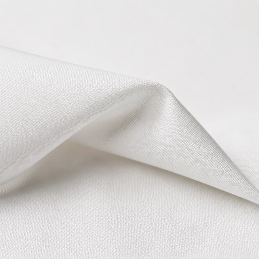 Macro photograph of crisp white cotton poplin.