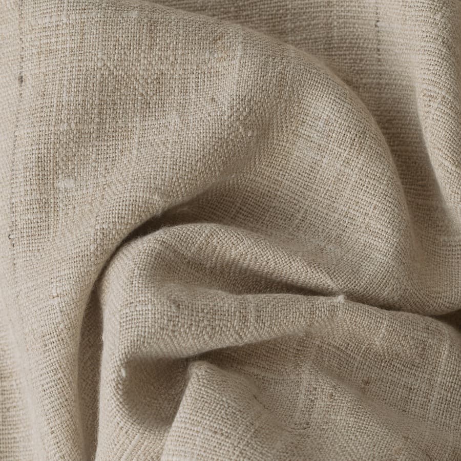 Macro photograph of natural oatmeal linen weave.